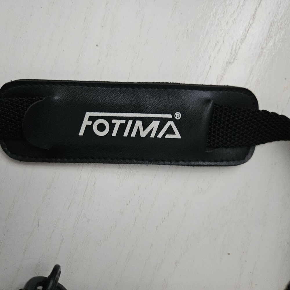 Fotima black camera carrying case model no. 60C with strap and pockets