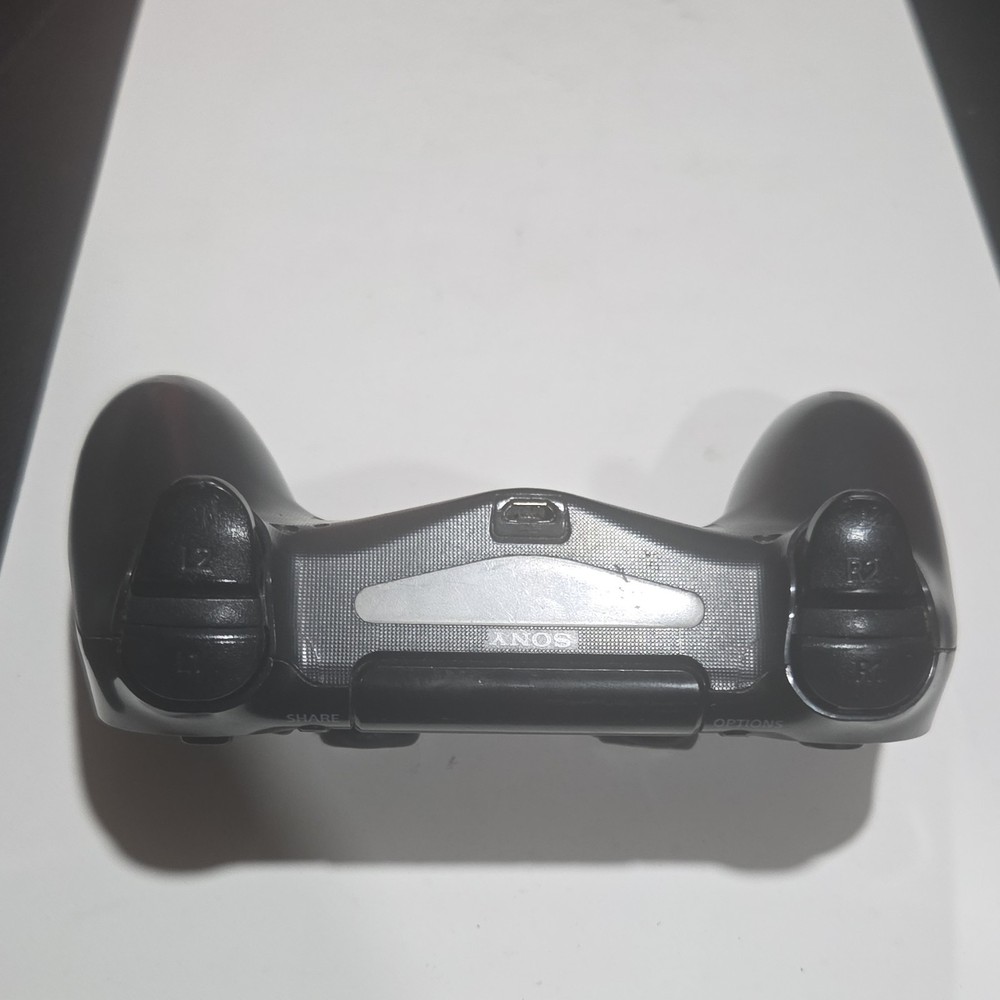Sony DualShock 4 Wireless Controller Black Pad for PlayStation 4 untested
