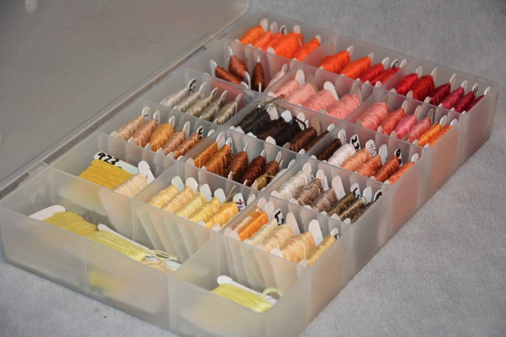 PLASTIC STORAGE BOX WITH EMBROIDERY FLOSS CROSS STITCH