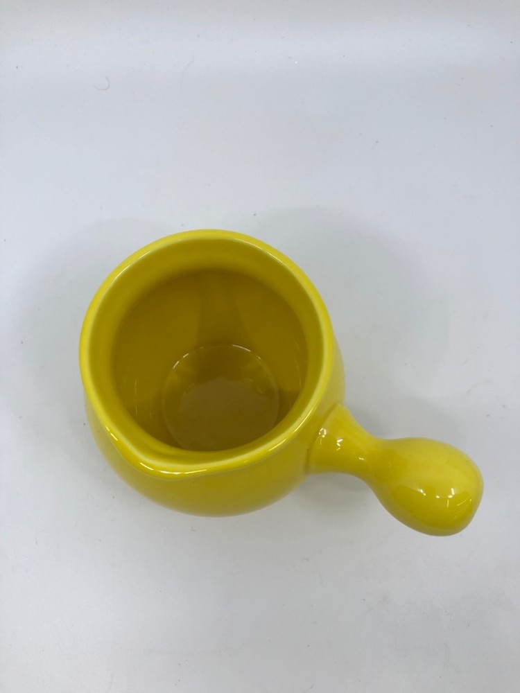YELLOW CERAMIC SYRUP PITCHER.