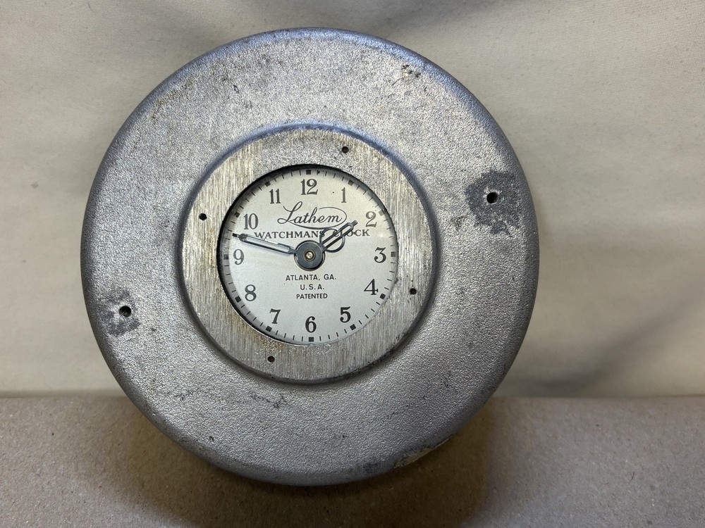 Lathem Watchmans Clock Untested but Ticks and Works when Held at Angle