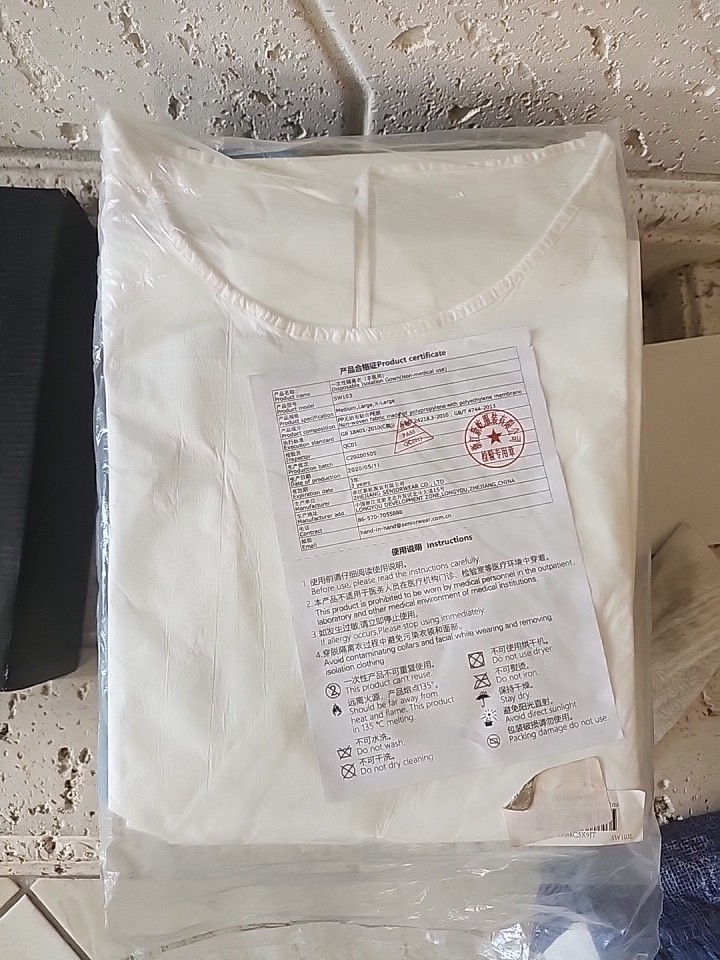 a label on a medical isolation gown or protective apparel