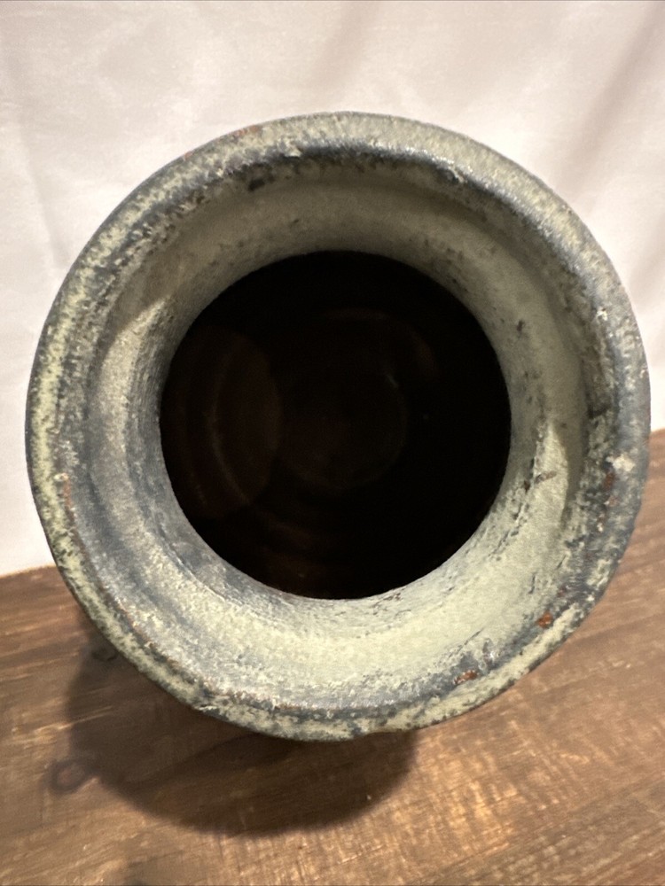 Vintage green vase with copper grape