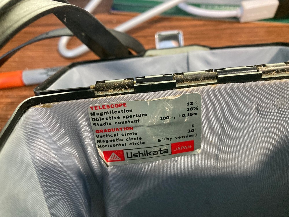 Slightly used Ushikata survey transit with case.