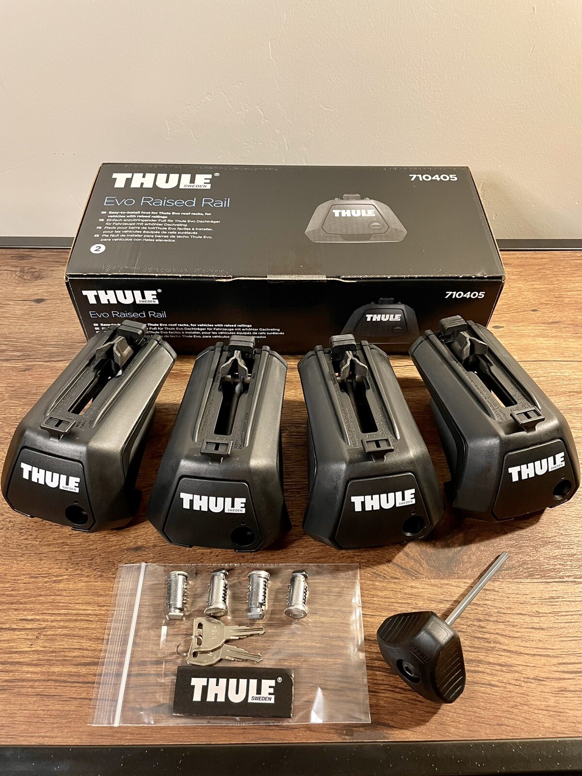 Thule Evo Raised Rail Foot Pack 710405 + Thule Metal Locks (Free $74.95 Value)