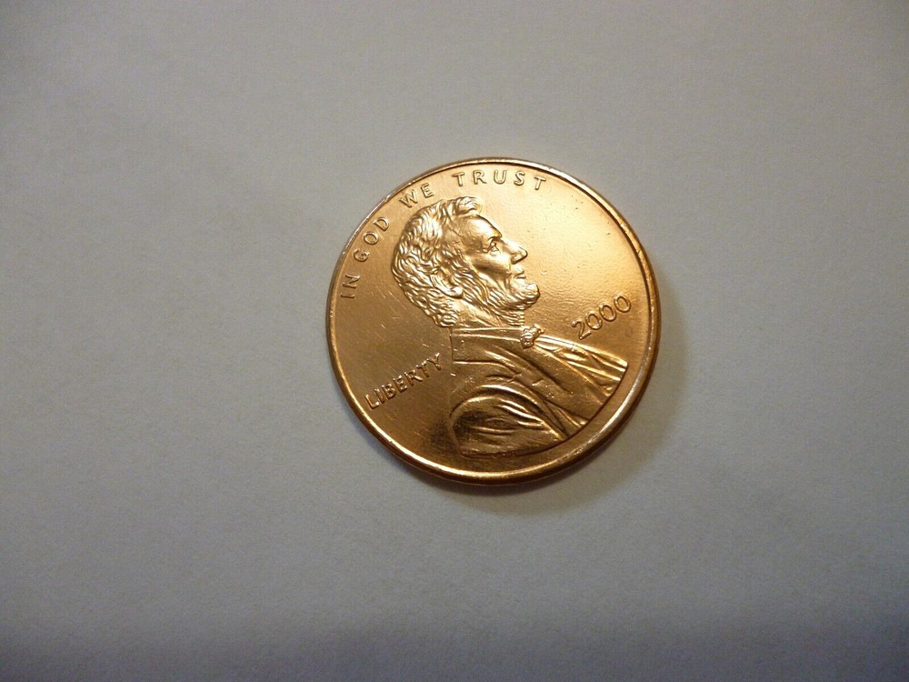 2000 penny, Floating roof coin