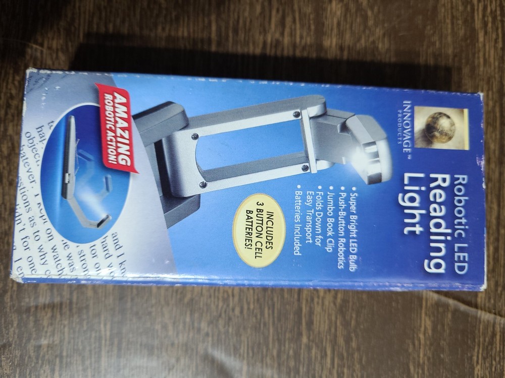 Robotic Led Reading Light Includes 3 Button Cell Batteries.