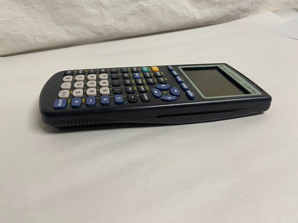 Texas Instruments TI-83 Plus Graphing Calculator Tested Working small dark spot