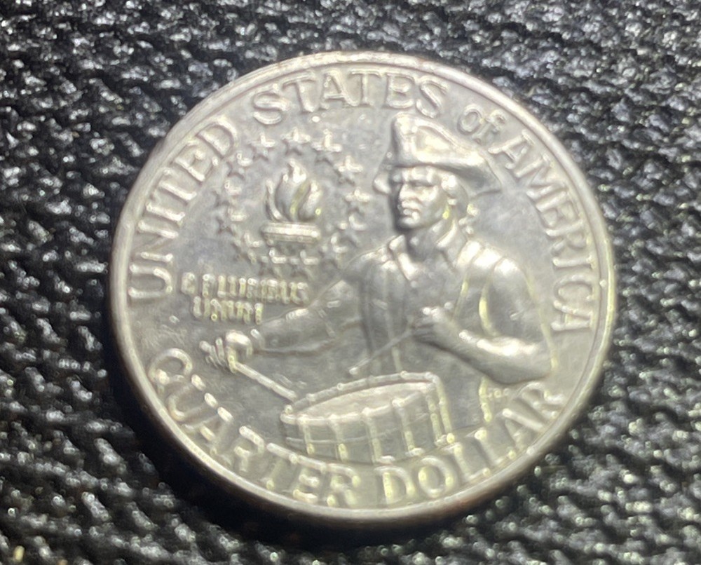 1776-1976 D US Bicentennial Quarter features a rare filled Mint Mark Regular