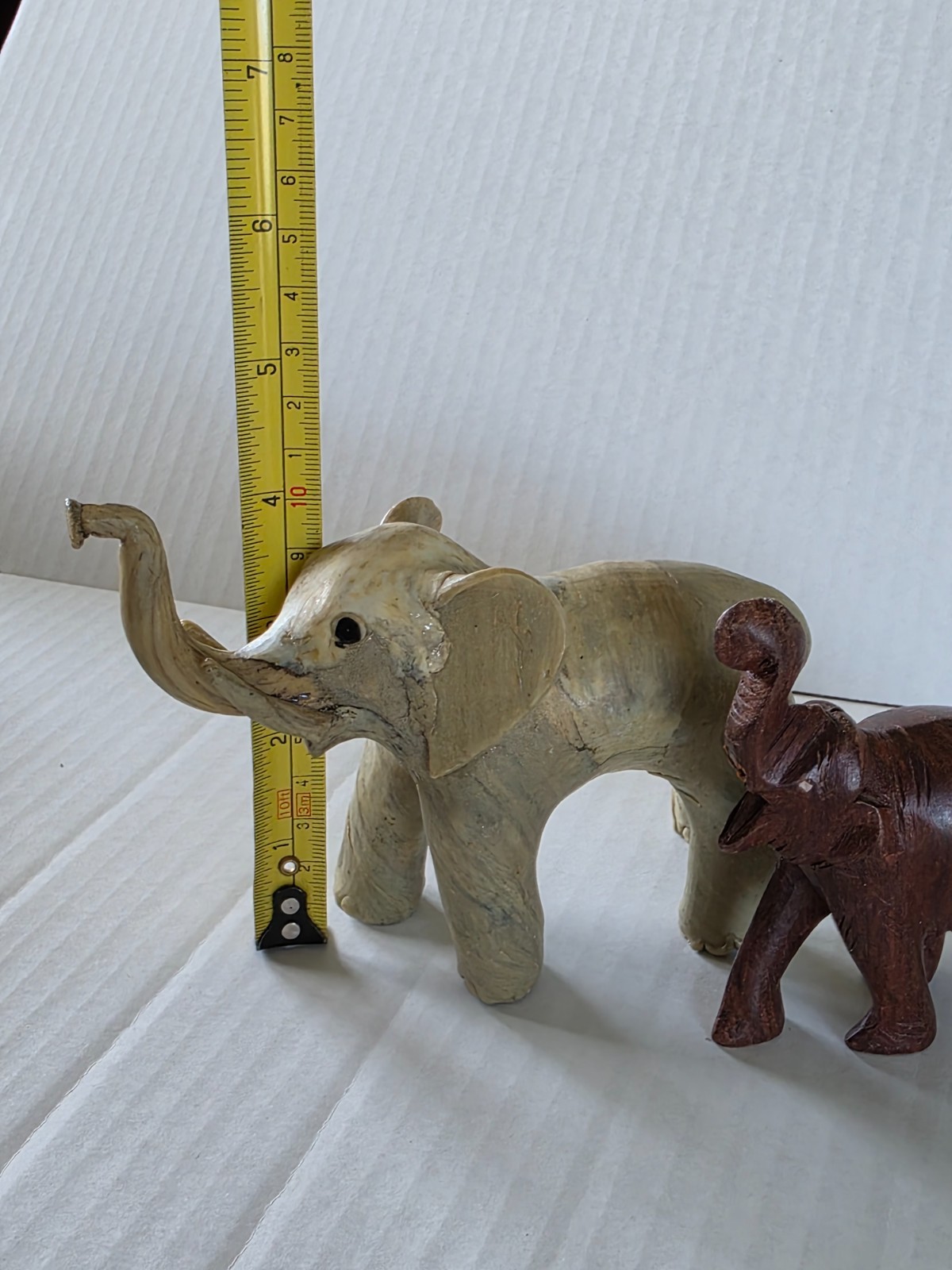 Three elephant figurines