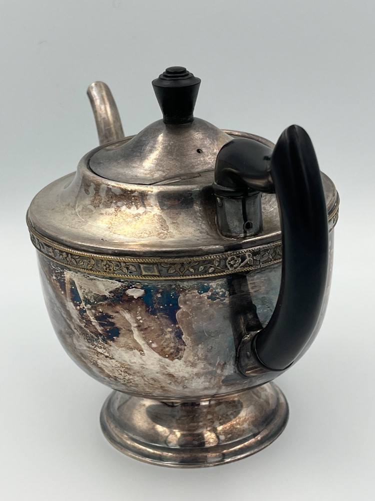 Antique silver plated teapot.