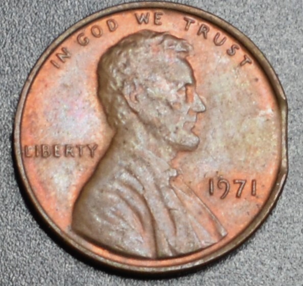1971 ERROR PENNY CLIPPED EDGE 49