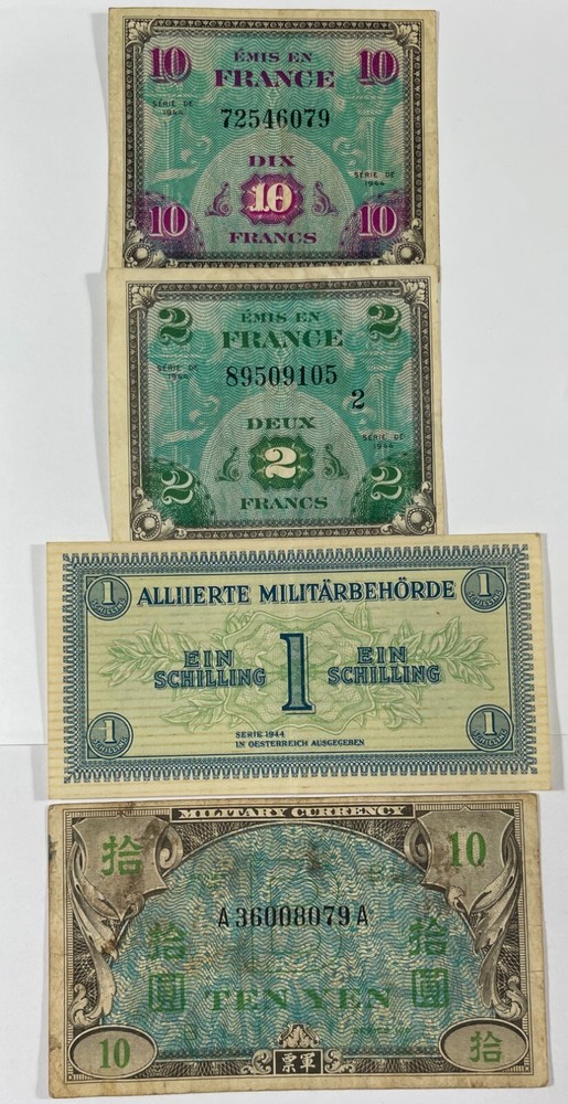Military currency 8 different pcs. (#474) includes one US. Mixed quality.