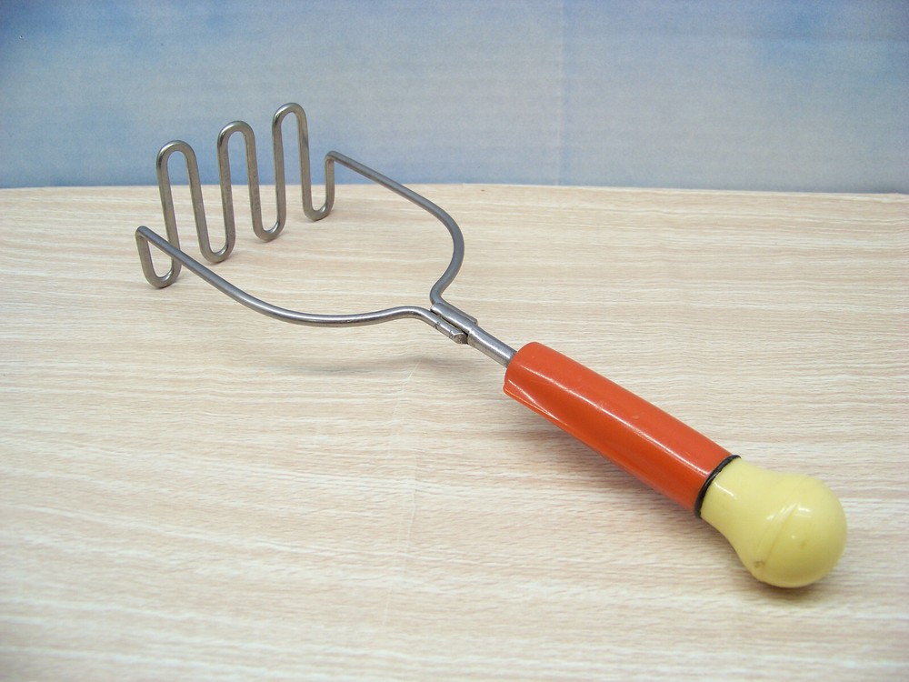 Bakelite Masher - Orange & Yellow Handle