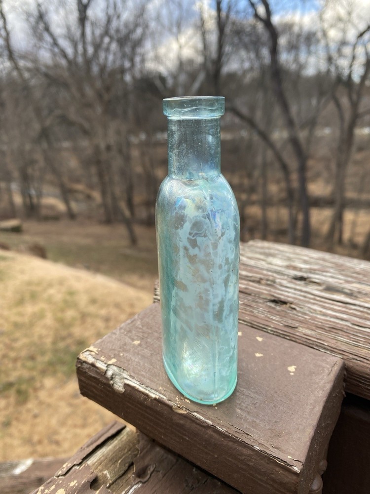 Week’s Snow Flake Blue Antique Bottle