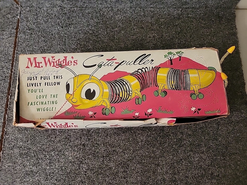 MR. WIGGLES CALA-PULLER SLINKY PULL TOY BOXED BY WILKENING  In Box