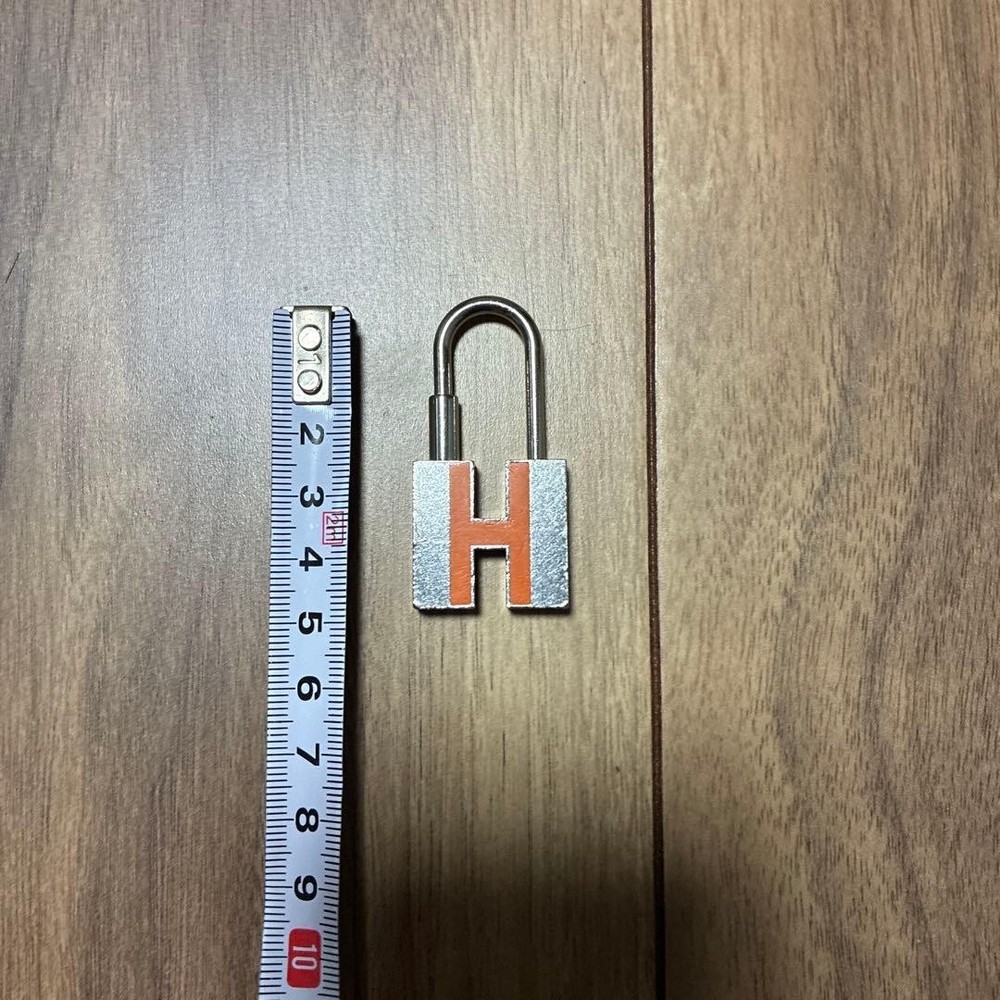 HERMES Cadena H Padlock Silver Orange With Box