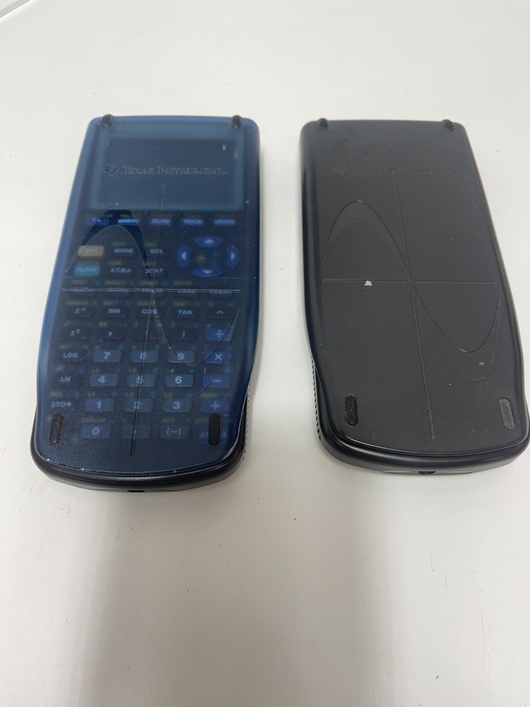 2 Texas Instruments TI-83 Graphing Calculators With Covers
