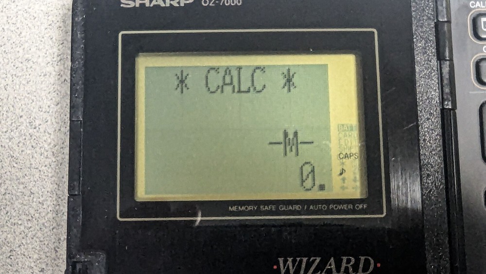 Sharp Wizard OZ-7000 Electronic Organizer with Time & Expense Manager Card