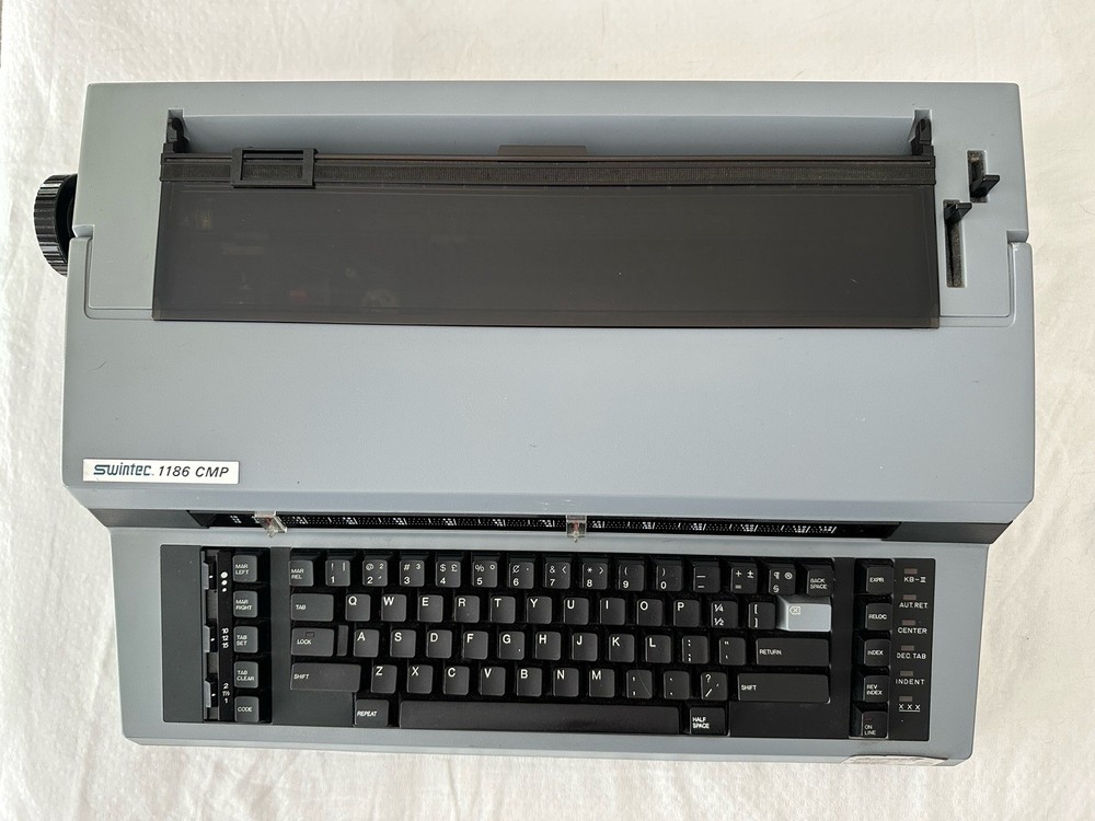 Swintec 1186 CMP Electronic Typewriter with extra daisy wheels