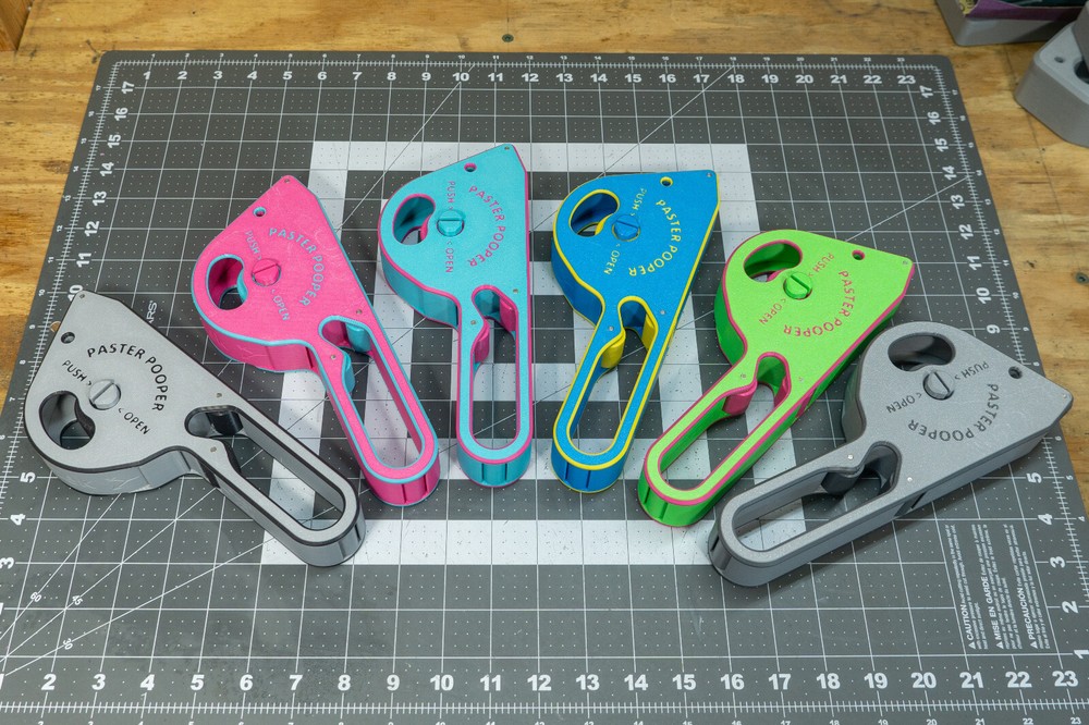 Paster Pooper - Paster Gun Sticker Applicator
