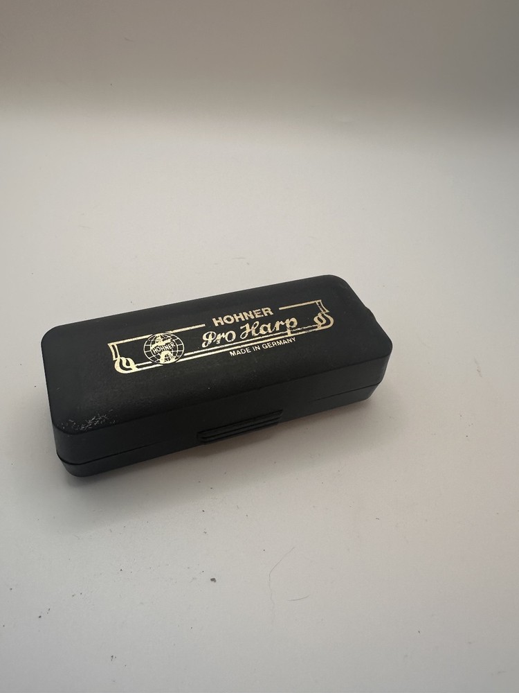 Vintage Old Black Hohner Pro Harp Harmonica D