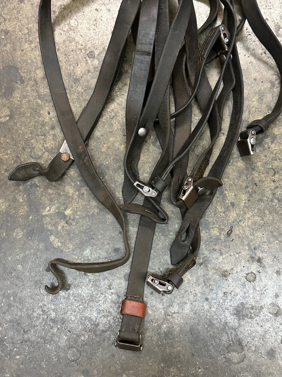 MAUSER 98K LEATHER SLING WITH METAL BUTON. SOLD "AS IS".