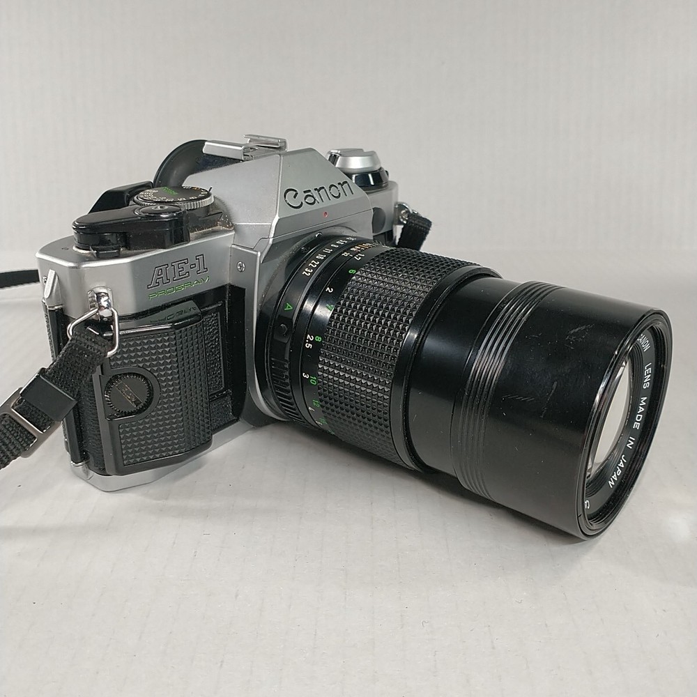 Canon AE-1 Program 35mm Camera Bundle With 50mm / 135 Lens Strap & Camera Bag