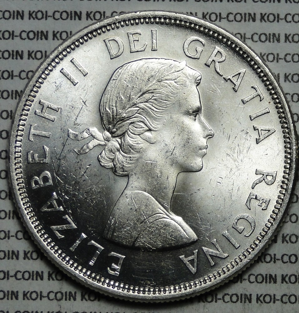 Canada 1864-1964 $1 silver dollar uncirculated scratches