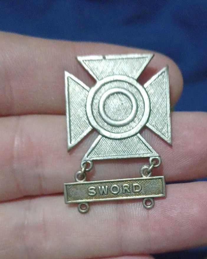 Pre-WW2 Sword Badge.