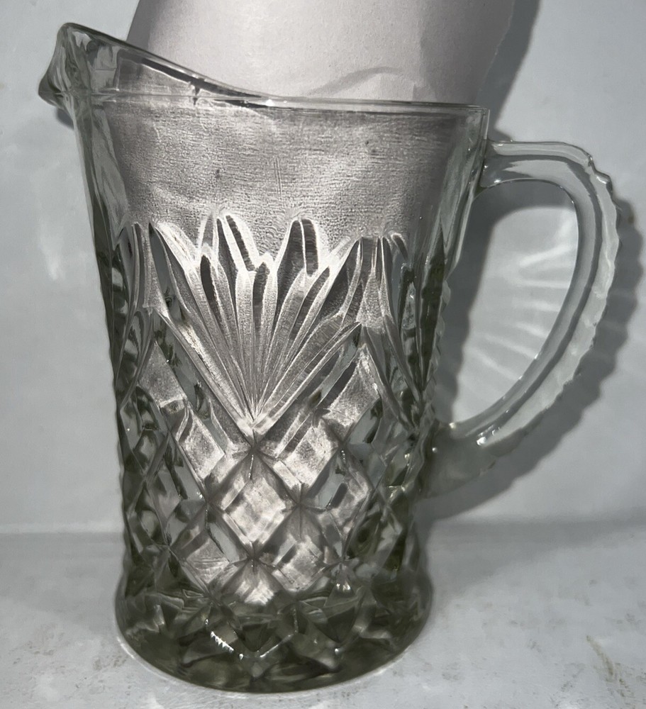 Cut glass pitcher 5 1/4" and 3 1/2" Diameter