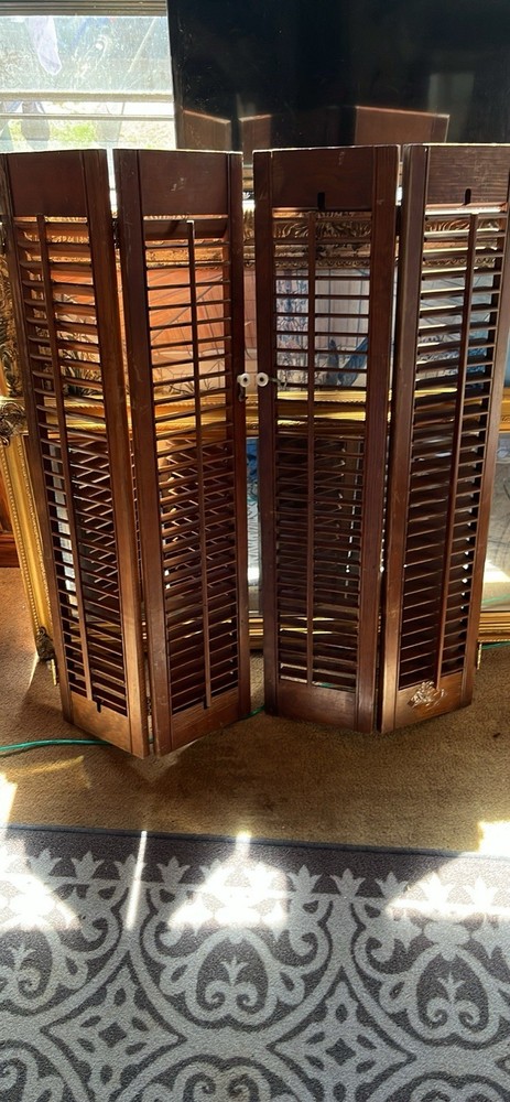 Vintage solid wood framed with hinges and knobs window shutters