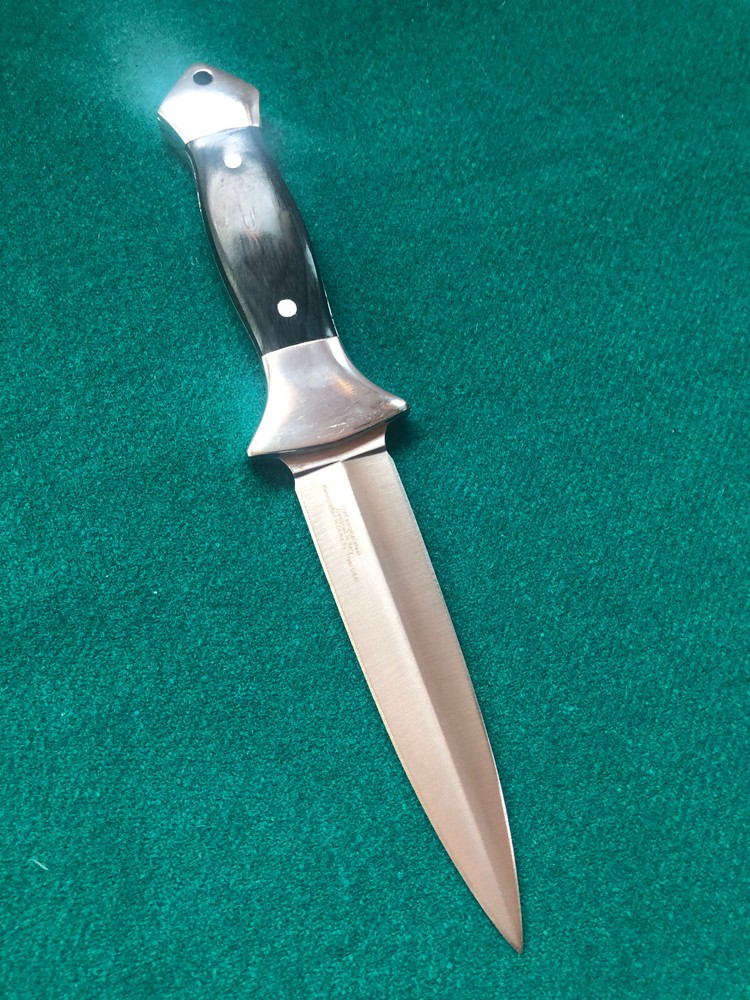 Dagger with black wooden handle