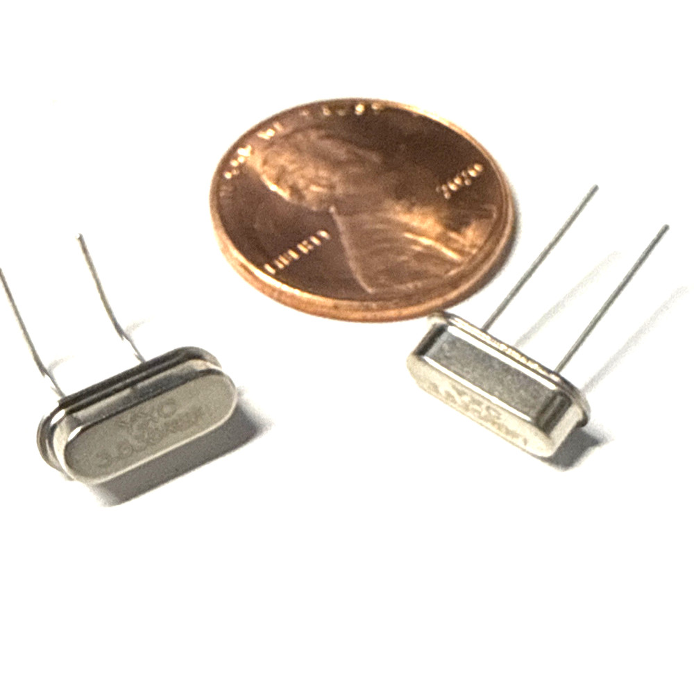 2 pcs 7.040 MHz Crystal. HC49/S