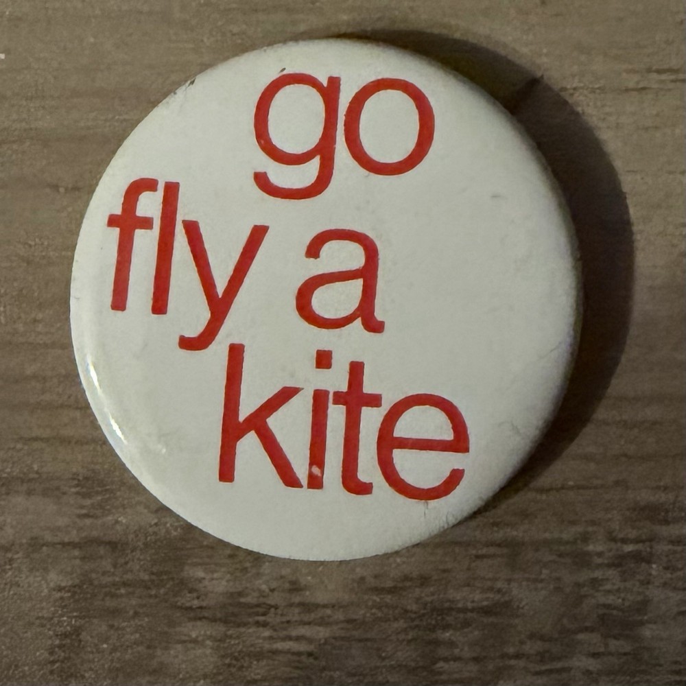 Vintage “Go Fly A Kite” Pinback Button. 1.75” (3/11)