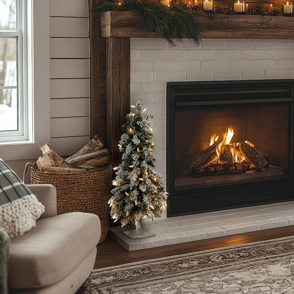 2 ft. Pre-Lit Snowy Downswept Forest Tree with Clear Lights, Plug-In