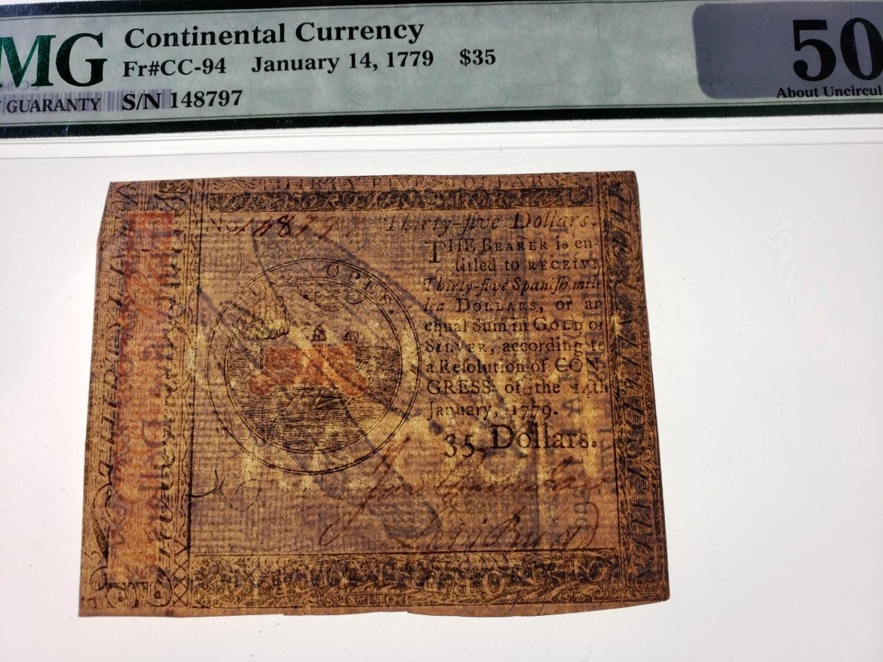 CC-94 *** PMG AU50 *** $35 January 14, 1779 Continental Colonial Currency Note