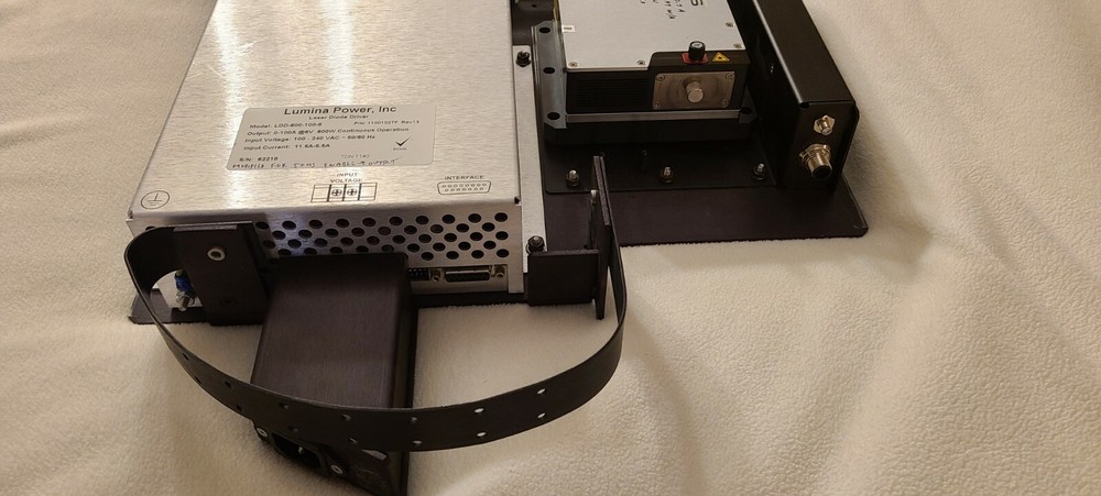 Coherent Laser Dilas with cooling block, interface unit and power supply.
