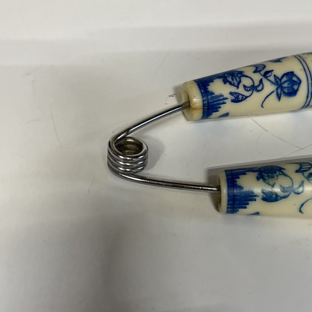 Bakelite White Blue Floral Spring Action Meat Serving Fork Slider