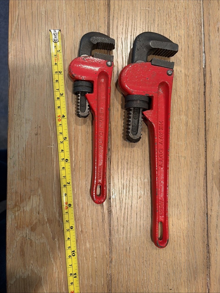 Two Pipe Wrenches 8” And 12”