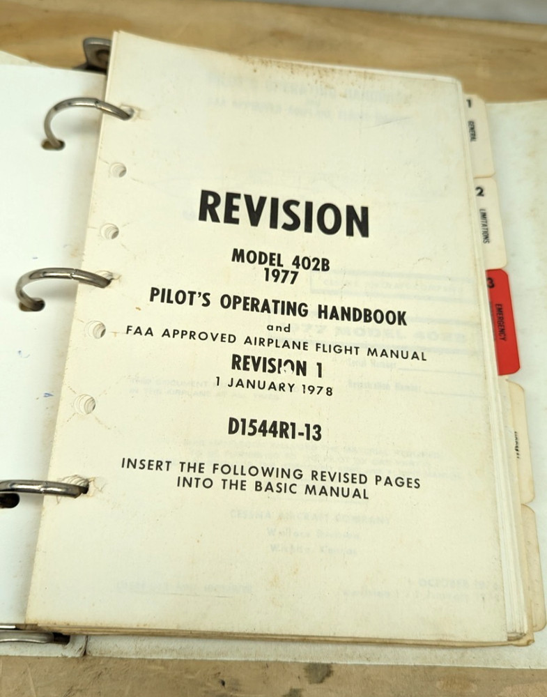 1977 Cessna 402B Pilot's Operating Handbook (binder)