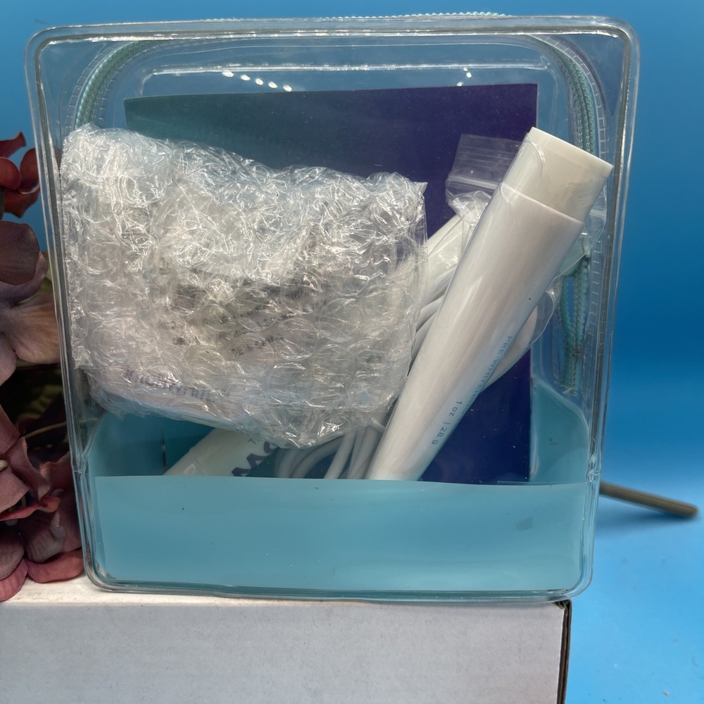New IntelliWHiTE Indiglow Teeth Whitening Light System