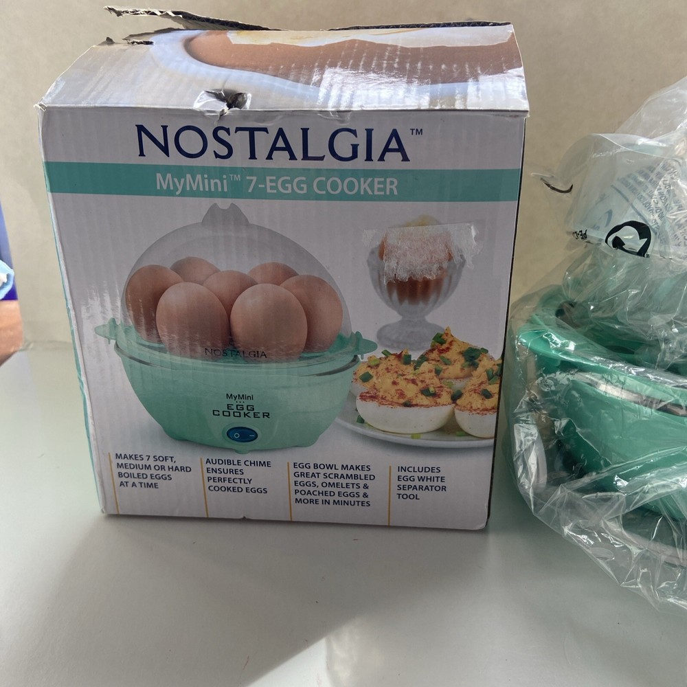 Nostalgia 7-Egg Cooker Hard Boiled Egg Piercer Steaming Tray