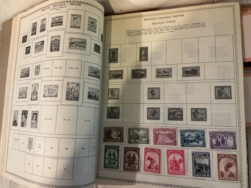 The New World Wide Postage Stamp Album with Over 775 Stamps See Photos