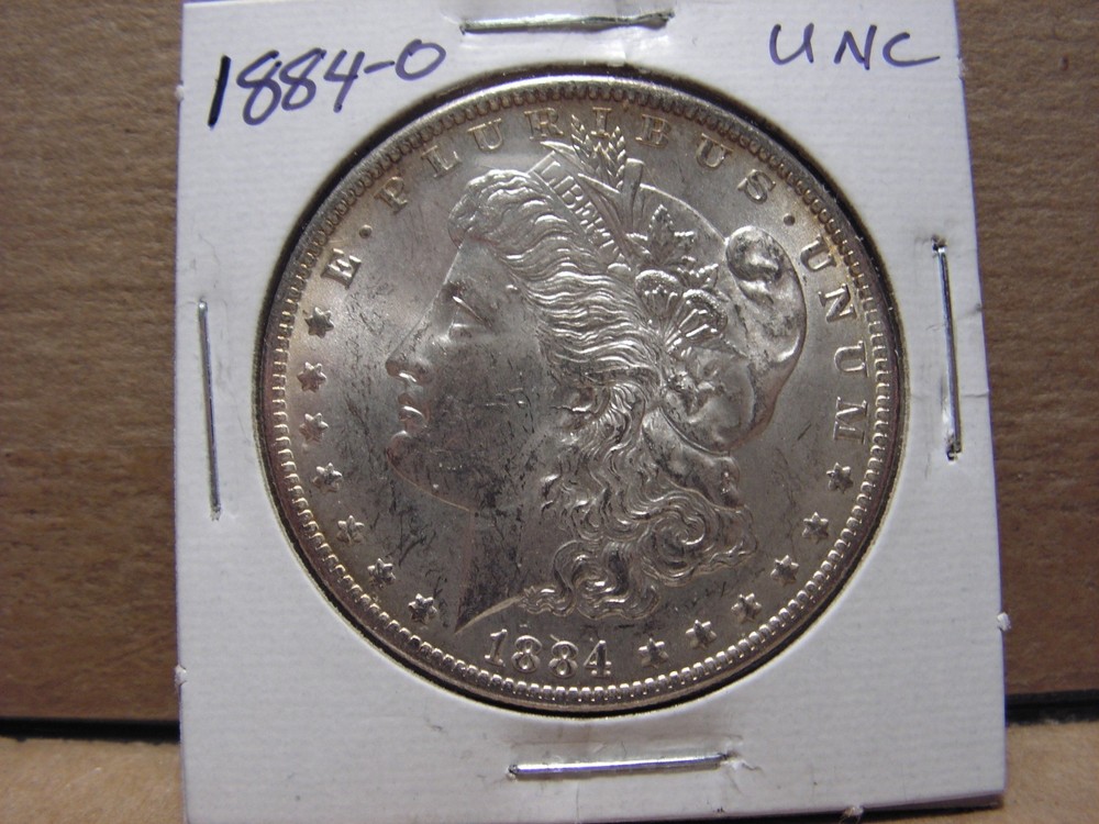 1884 - O Morgan Silver Dollar, UNC.