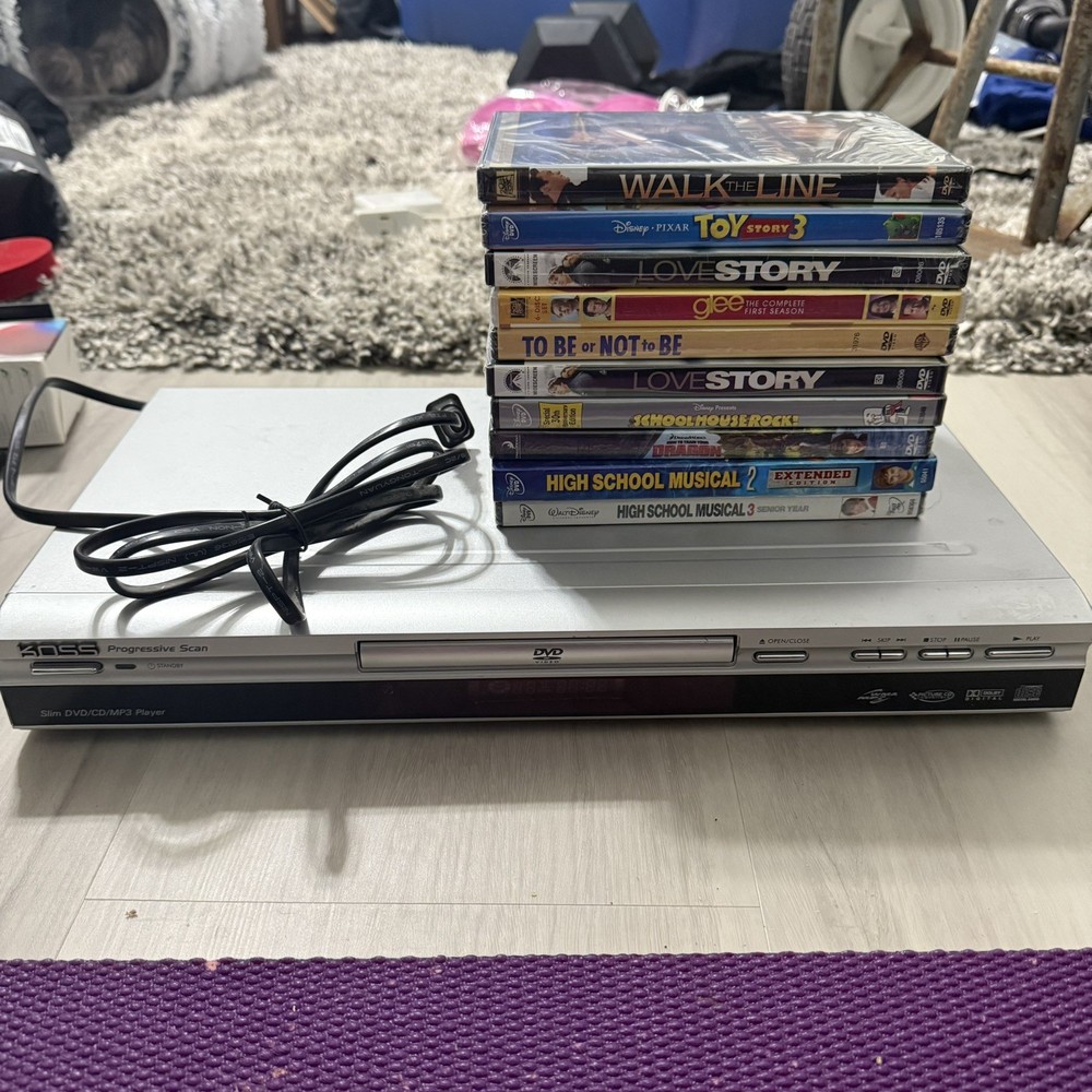 Koss DVD / CD / MP3 Player KD365 with Sealed DVD Bundle