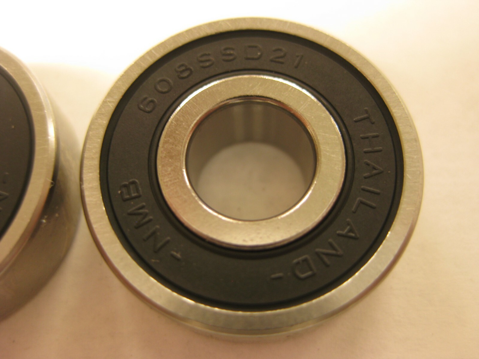 NMB 608SSD21 single row ball bearing.  Made in Thailand  ID is .314", see pics