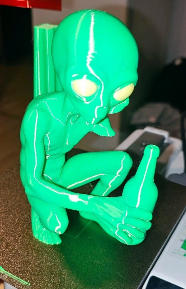 Alien Drinking A Beer Figure