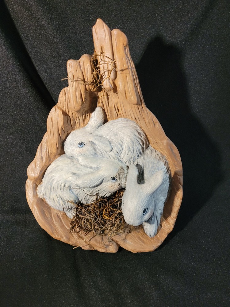 Decorative Ceramic Three Rabits Nestled Within a Tree Stump