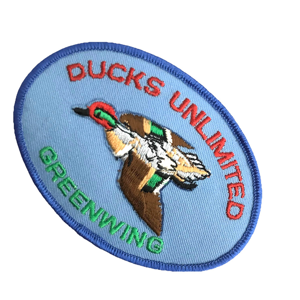 Ducks Unlimited Greenwing Patch Vintage Blue Background
